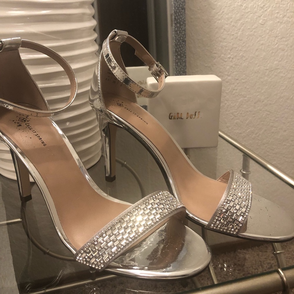 New! Only worn once. Silver sparkle ankle strap.